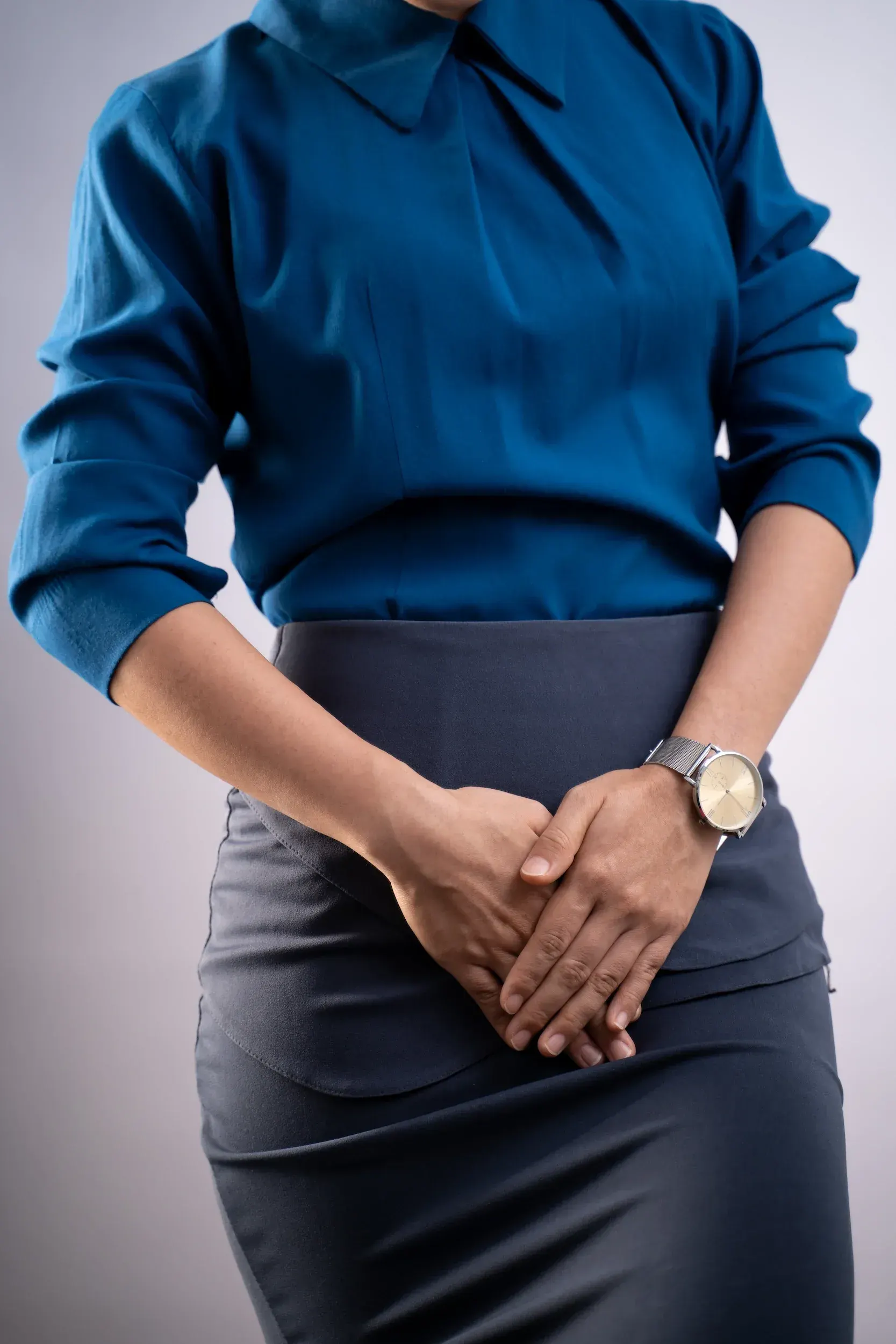 Woman reflecting on pelvic floor symptoms at Hartley Health and Wellness Canton