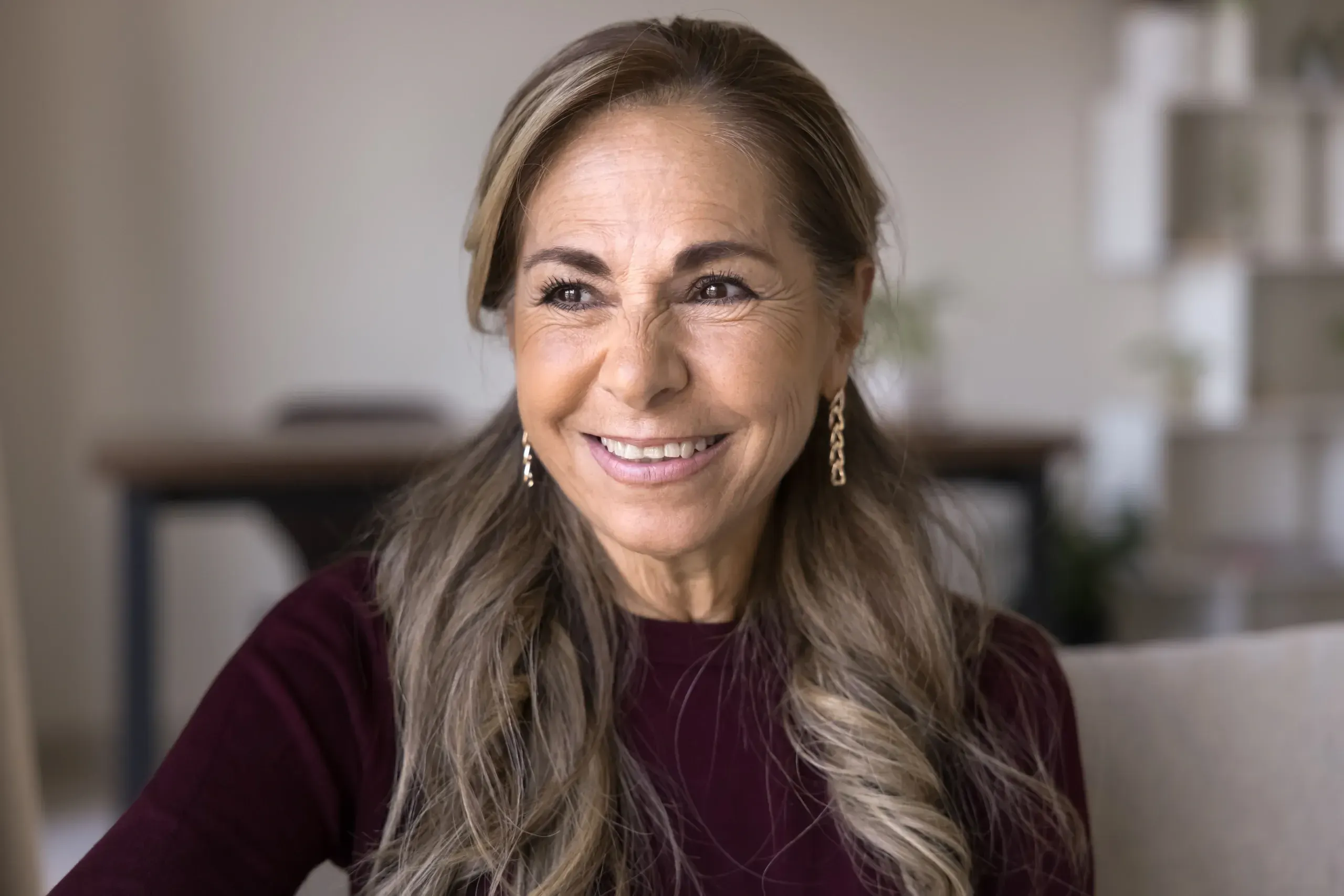 Close-up of fine lines and wrinkles on a mature face at Hartley Health and Wellness